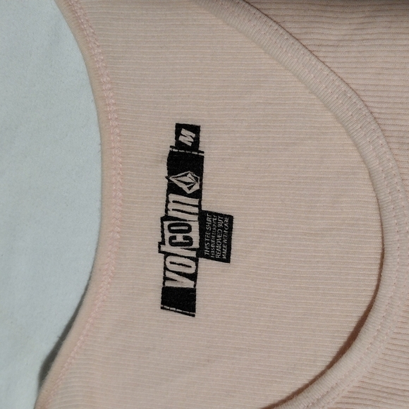Volcom medium tank top pink with black. Small pin hole. See pic - Picture 4 of 7